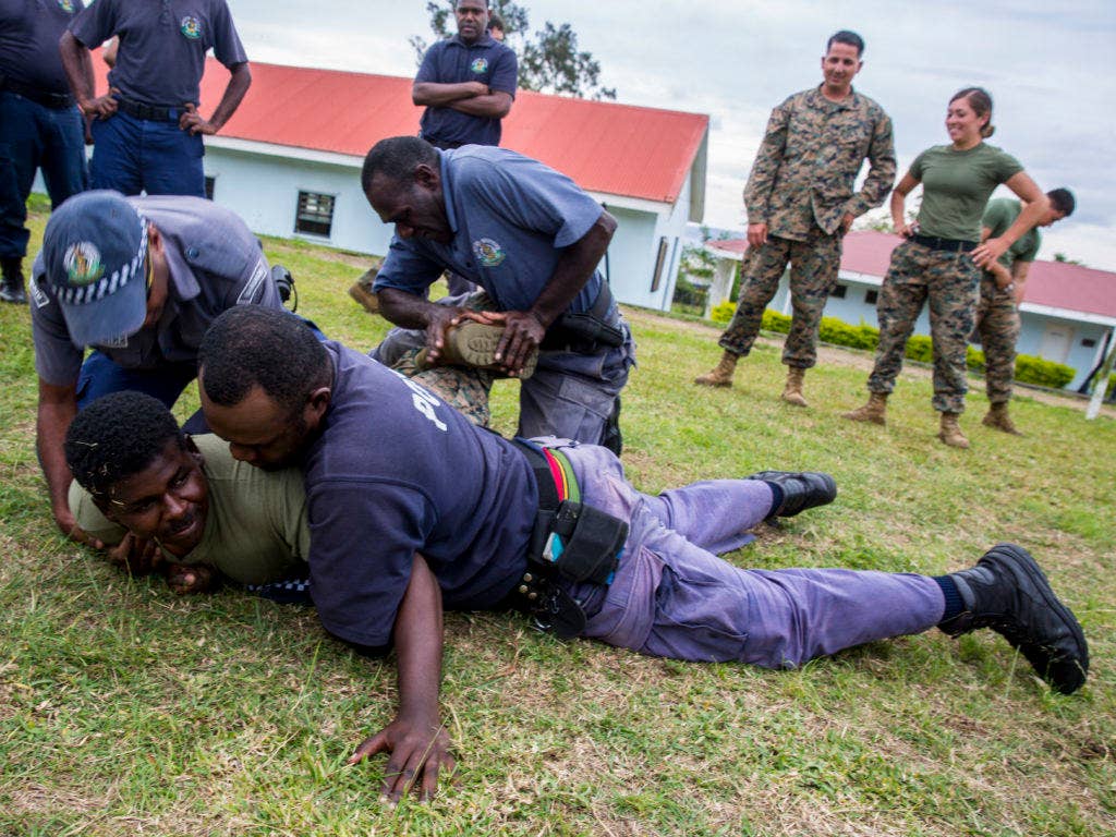 American Marines and Republic of Vanuatu Police Force officers train together on frisk and search procedures on Oct. 26, 2016, at Port Vila, Vanuatu. (Photo: U.S. Marine Corps Lance Cpl. Quavaungh Pointer