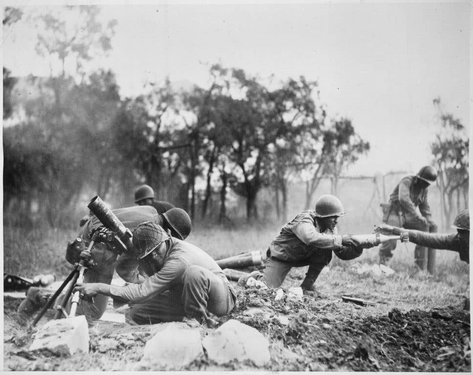 World War II mortarmen attack German positions in 1944. (Photo: National Archives and Records Administration)