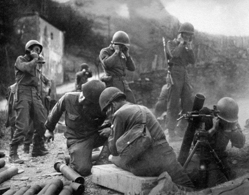 An American mortar crew attacks German positions on the Rhine in 1945. (Photo: National Archives and Records Administration)