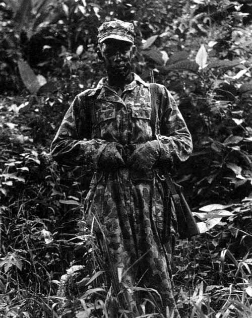 An Alamo Scout in camouflage training. (U.S. Army photo)