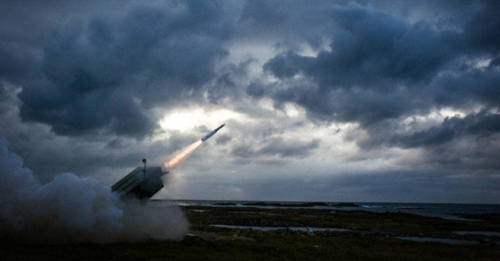An AMRAAM-Extended Range missile is fired from a NASAMS launcher. The missile successfully engaged and destroyed a target drone during a flight test at the Andoya Space Center in Norway. (Photo: courtesy Raytheon Company)