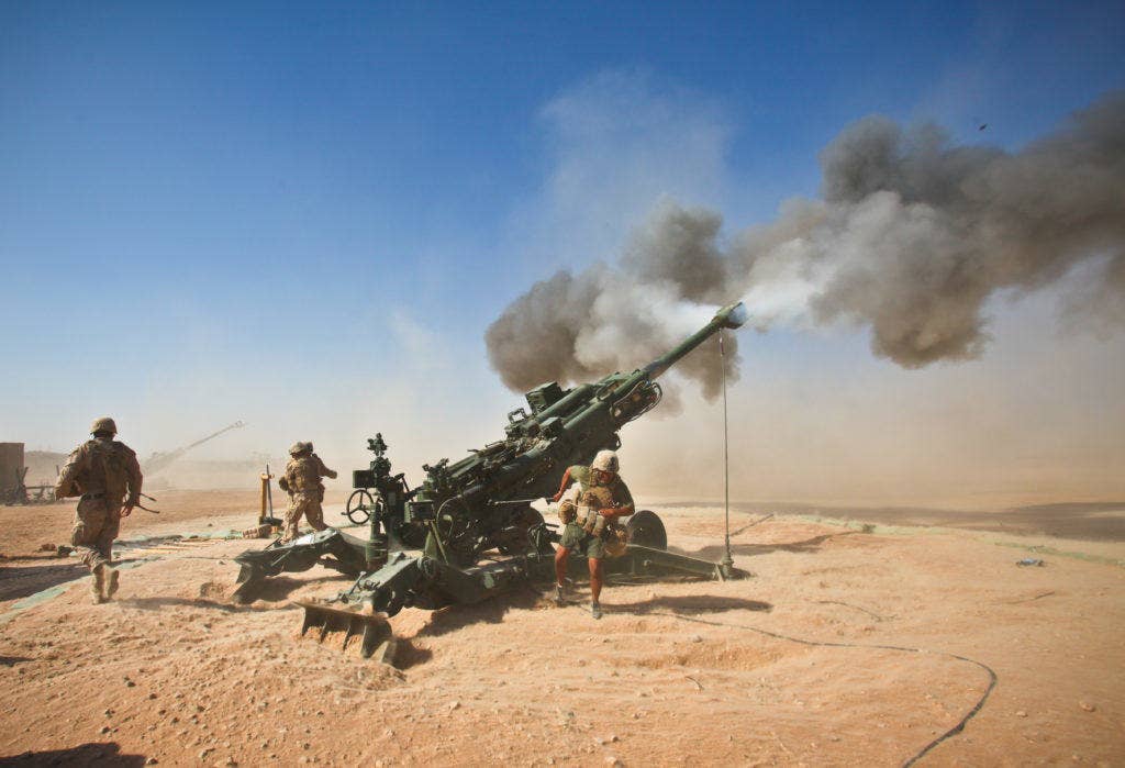 Marines with Charlie Battery, 1st Battalion, 12th Marine Regiment, fire an M982 Excalibur round from an M777 howitzer during a recent fire support mission. (U.S. Marine Corps photo)