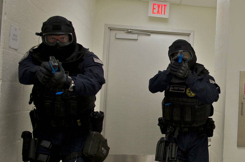 Tactical Law Enforcement Team South members participate in a Law Enforcement Active Shooter Emergency Response class at the Miami Police Department Training Center, July 20, 2012. (U.S. Coast Guard photo by Petty Officer 2nd Class Michael Anderson).