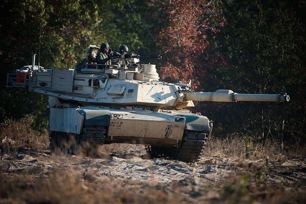 Students from the Armor Basic Leader Course at Fort Benning, Georgia, train during a combined competitive maneuver exercise at Benning's Good Hope Training Area on Nov. 16, 2016. | U.S. Army photo