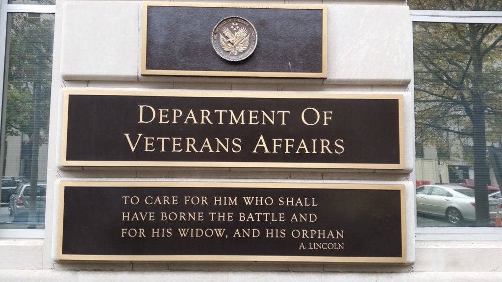 A quote from Abraham Lincoln on a sign at the Department of Veterans Affairs Building in Washington, DC. | Photo via Flickr