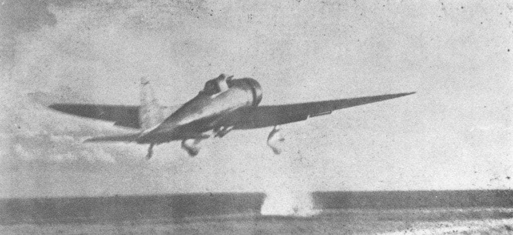 An Aichi D3A Type 99 kanbaku (dive bomber) launches from the Imperial Japanese Navy aircraft carrier Akagi to participate in the second wave during the attack on Pearl Harbor, Hawaii. | Photo courtesy of the Makiel Collection via Ron Wenger