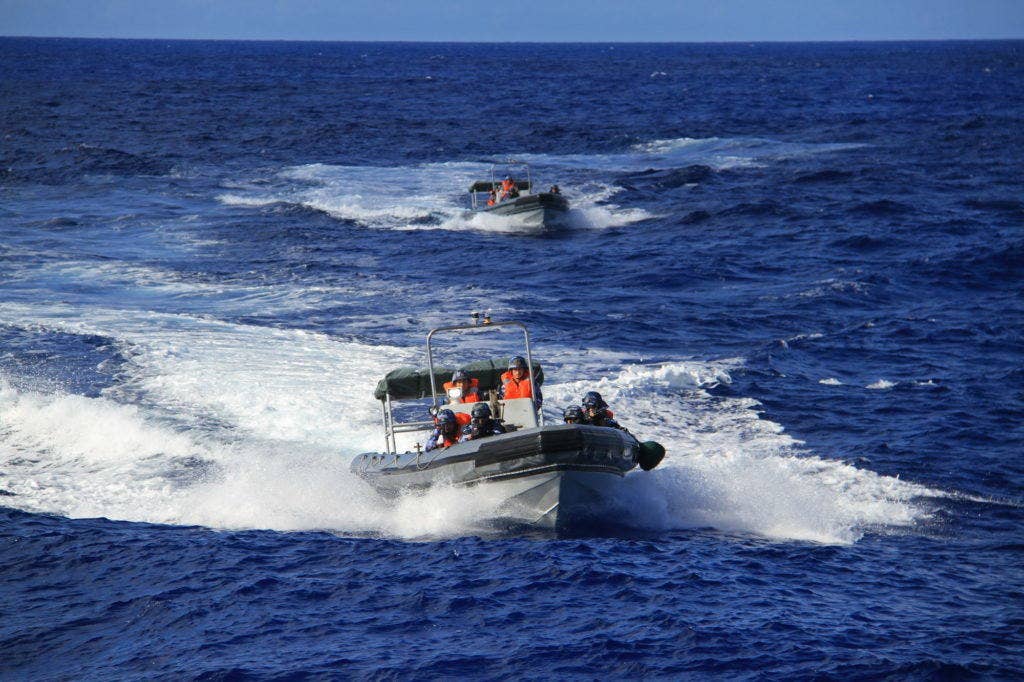 Chinese sailors travel in rigid hull inflatable boats while participating in a visit, board, search and seizure exercise between China, Indonesia, France and the United States, during Rim of the Pacific 2016. (Chinese navy photo by Wenxuan Zhuliang)