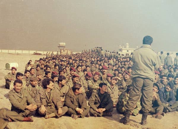 1,400 soldiers of the 440th Iraqi Brigade surrender to the U. S. Marines of the 13th Marine Expeditionary Unit Special Operations Capable on Failaka Island, Kuwait Mar 03, 1991. (Official U. S. Marine Corp photograph by SSgt Angel Arroyo 13th MEU SOC Combat Camera/Released)