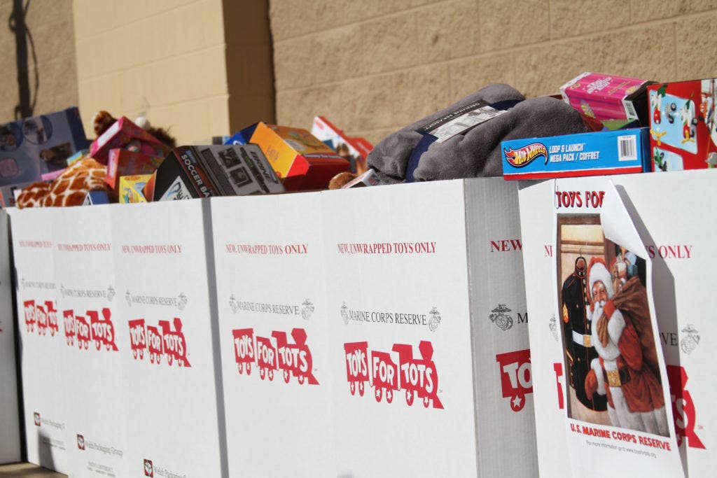 Boxes of toys stand filled to the top with donations for the Toys for Tots Program in Montgomery, Alabama, during the Marines' toy drive Dec. 13, 2014. (U.S. Marine Corps photo)