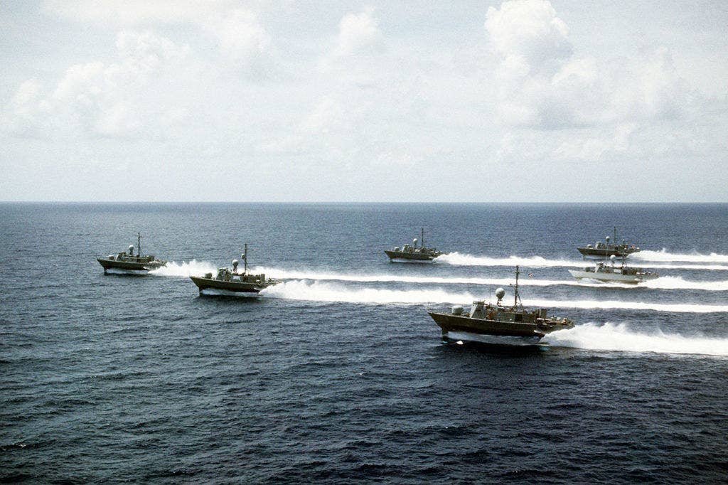 Six vessels of Patrol Combatant Missile Hydrofoil squadron 2 travel in formation en route to Naval Amphibious Base, Little Creek, Va. for decommissioning. The formation includes the USS PEGASUS (PHM-1), USS HERCULES (PHM-2), USS TAURUS (PHM-3), USS AQUILA (PHM-4), USS ARIES (PHM-5) and USS GEMINI (PHM-6). (DOD Photo)