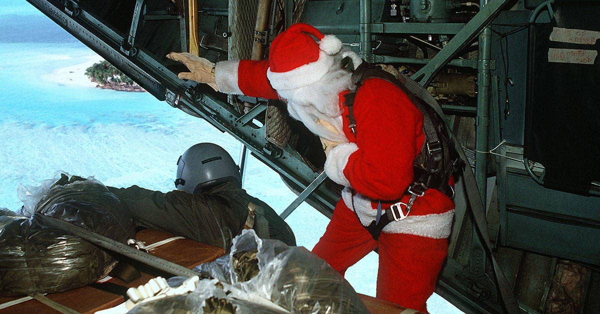 USAF airmen take on the role of Santa for &#8216;Operation Christmas Drop&#8217;