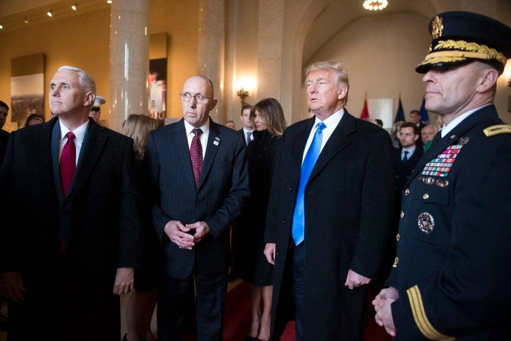 Gary S. Davis, second left, deputy director ceremonies and special events/chief of ceremonies, U.S. Army Military District of Washington, and Maj. Gen. Bradley A. Becker, right, Commanding General, Joint Task Force-National Capital Region and the U.S. Army Military District of Washington, brief President-elect Donald J. Trump, third from left, and Vice President-elect Mike Pence, left, prior to a wreath-laying ceremony at the Tomb of the Unknown Soldier in Arlington National Cemetery, Jan. 17, 2017, in Arlington, Va. Trump and Pence placed a wreath at the Tomb. (U.S. Army photo by Rachel Larue/Arlington National Cemetery/released)
