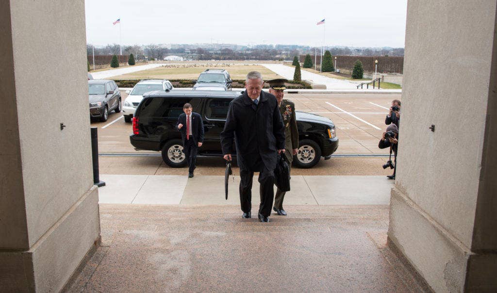 Secretary of Defense James Mattis greets U.S. Marine Corps Gen. Joseph Dunford, Chairman of the Joint Chiefs of Staff, after arriving at the Pentagon in Washington, D.C., Jan. 21, 2017. (DOD photo by Air Force Tech. Sgt. Brigitte N. Brantley)