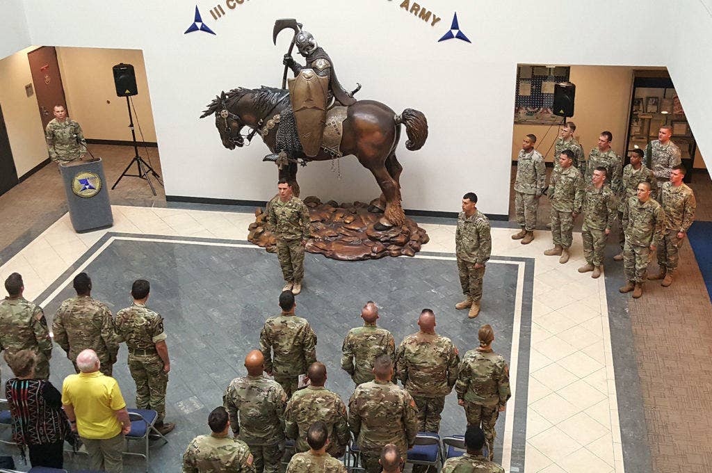 Soldiers with Delta Company, 52nd Infantry Regiment (Long Range Surveillance) conduct their unit's deactivation ceremony Jan. 10, 2017 inside the III Corp building at Fort Hood, Texas. (Photo: U.S. Army Sgt. 1st Class Jory Mathis)