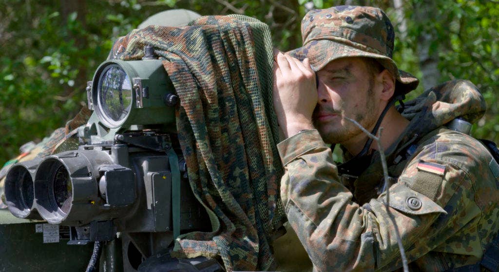 Internationally, long-range reconnaissance is still in high demand. German army Upper Cpl. Andre Schadler, a native of Aulendorf, assigned to Recon Platoon, Jager Battalion 292, scans the battlefield for threats with a thermal sight during the first day of training at the Great Lithuanian Hetman Jonusas Radvila Training Regiment, in Rukla, Lithuania, June 10, 2015. (Photo: U.S. Army Sgt. James Avery, 16th Mobile Public Affairs Detachment)