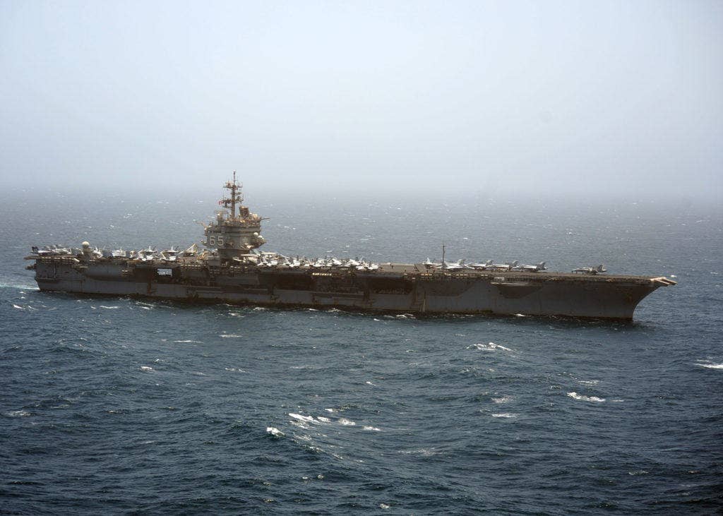The aircraft carrier USS Enterprise (CVN 65) transits the Arabian Sea on her last deployment. Enterprise was deployed to the U.S. 5th Fleet area of responsibility conducting maritime security operations, theater security cooperation efforts and support missions for Operation Enduring Freedom. Even at 51, she could still kick ass. (U.S. Navy photo by Mass Communication Specialist 3rd Class Jared King/Released)