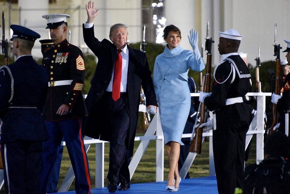 President Donald Trump and First Lady Melania head to the Inaugural Parade reviewing stand from the White House in Washingtion, D.C., Jan. 20, 2017. Trump was sworn-in as the 45th president of the United States earlier in the day. | U.S. Coast Guard photo by Petty Officer 2nd Class Patrick Kelley.