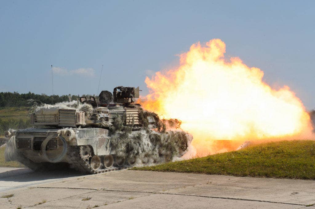 U.S. Soldiers with the 2nd Battalion, 7th Infantry Regiment, 1st Armored Brigade Combat Team, 3rd Infantry Division, fire an M1A2 SEPv2 Abrams Main Battle Tank during exercise Combined Resolve VII at the 7th Army Training Command in Grafenwoehr, Germany, Aug. 18, 2016. (U.S. Army photo by Visual Information Specialist Markus Rauchenberger)