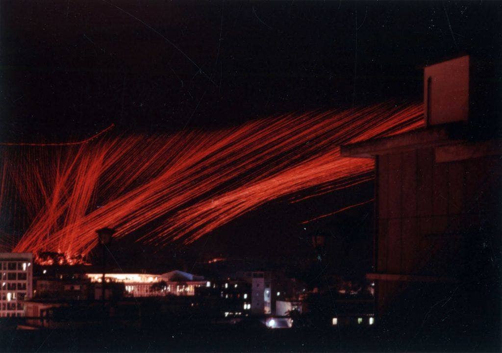 Night attack of a U.S. Air Force Douglas AC-47D Spooky gunship over Saigon in 1968. This time lapse photo shows the tracer round trajectories. (Photo: Public Domain)