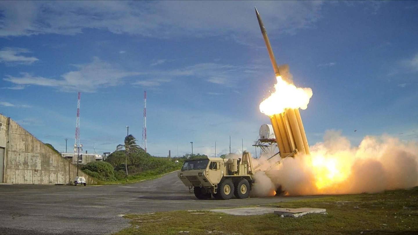 The first of two Terminal High Altitude Area Defense (THAAD) interceptors is launched during a successful intercept test. The test, designated Flight Test Operational-01 (FTO-01), stressed the ability of the Aegis BMD and THAAD weapon systems to function in a layered defense architecture and defeat a raid of two near-simultaneous ballistic missile targets. (DOD photo)