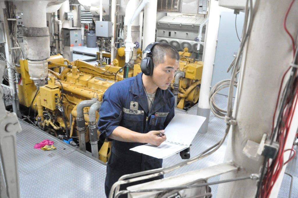 Spc. Dongbina Kwon, a watercraft engineer with the 1099th Transportation Detachment assigned to the SP4 James A. Loux, Logistical Support Vehicle-6, conducts a check of the engine room during a mission in the Persian Gulf March 1, 2016. Watercraft engineers have to be trained to work on dozens of components because there are no specialty fields used on Army boats. (Photo: U.S. Army Sgt. Walter Lowell)