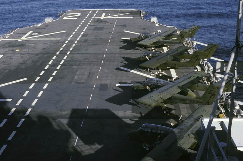 This photo shows a row of OV-10 Broncos parked on the deck of the amphibious assault ship USS Saipan. (WATM photo)