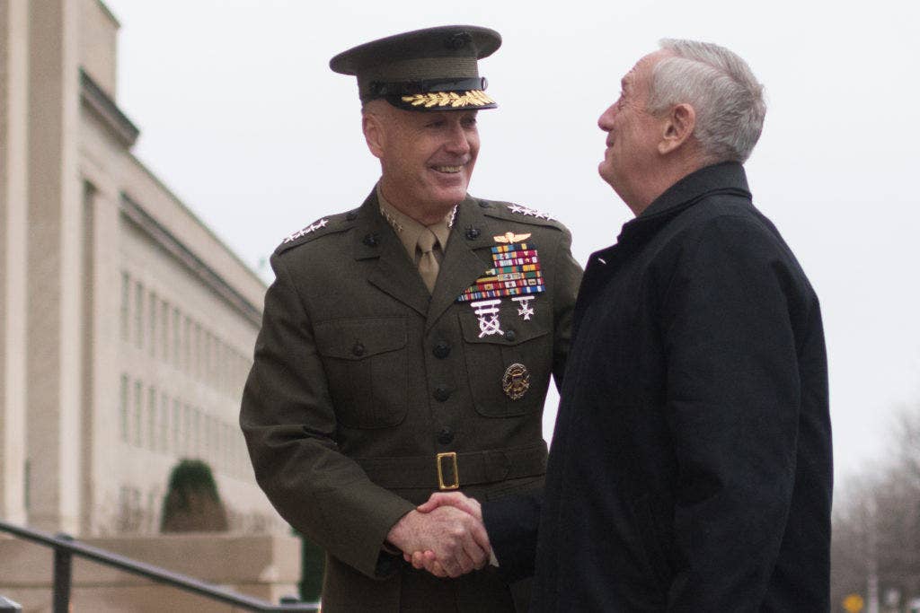 The 26th Secretary of Defense, James Mattis, is greeted on his first full day in the position by Chairman of the Joint Chiefs of Staff, Gen. Joseph F. Dunford Jr., in Arlington, VA, Jan. 21, 2017. DoD photo by D. Myles Cullen (released)