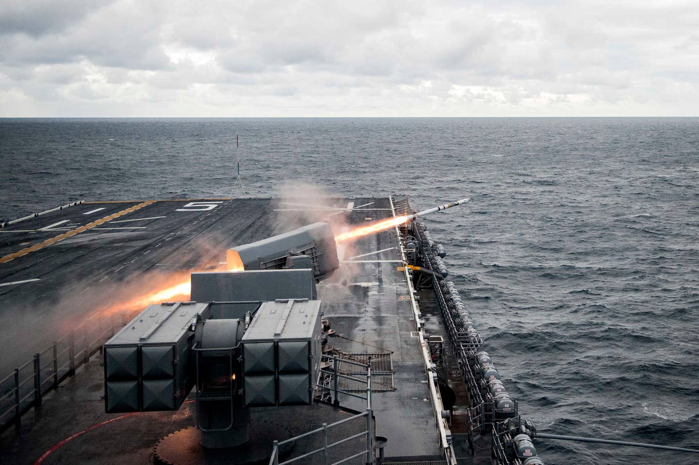 The amphibious assault ship USS Bataan (LHD 5) conducts a live-fire exercise with the ship's RIM 116 Rolling Airframe Missile weapon system. Bataan is underway conducting composite training unit exercise (COMPTUEX) with the Bataan Amphibious Ready Group in preparation for an upcoming deployment. (U.S. Navy photo by Mass Communication Specialist 2nd Class Petty Officer Nicholas Frank Cottone)