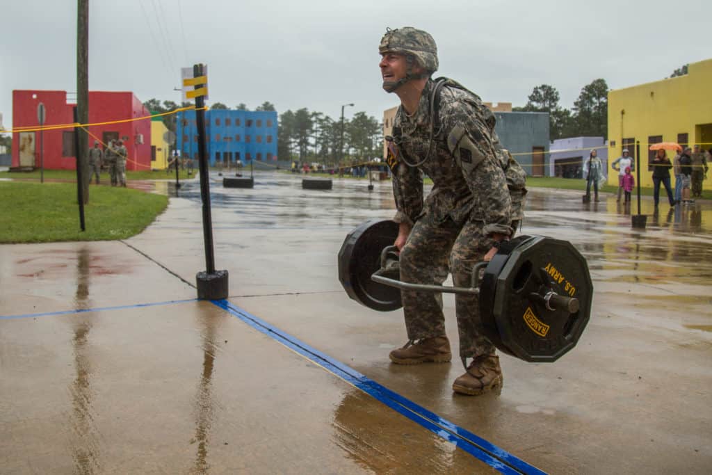 U.S. Army Capt. Jason Parsons, a Medical Activity pharmacist assigned to Fort Jackson, lifts a weighted trap bar during the Urban Assault Course at the Best Ranger Competition 2016 on Ft. Benning, Ga., April 15, 2016. The 33rd annual David E. Grange Jr. Best Ranger Competition 2016 is a three-day event consisting of challenges that test competitors' physical, mental, and technical capabilities. (U.S. Army Photo by Staff Sgt. Brian Kohl)