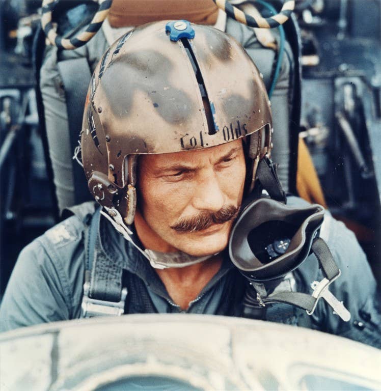 Then Col. Robin Olds seated in an F-4 fighter in Southeast Asia. The helmet he is wearing in the photo is on display in the National Museum of the United States Air Force in Dayton, Ohio. (U.S. Air Force Photo)
