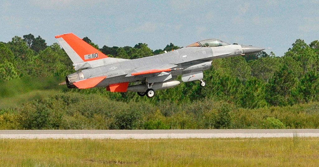 A QF-16 full scale aerial target from the 82nd Aerial Targets Squadron takes off on its first unmanned flight at Tyndall Air Force Base, Fla. Sept. 19, 2013. The 82nd ATRS operates the Department of Defense's only full-scale aerial target program. The QF-16 will provide a fourth generation fighter representation of real world threats . (U.S. Air Force photo/Staff Sgt. Javier Cruz)
