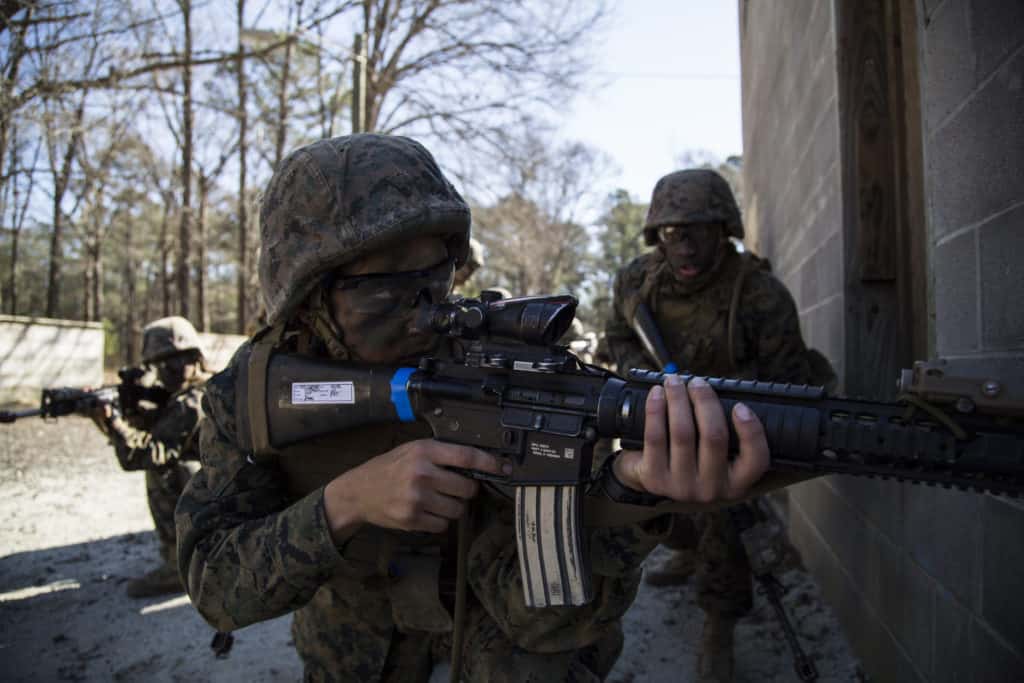 marine infantrymen with weapons
