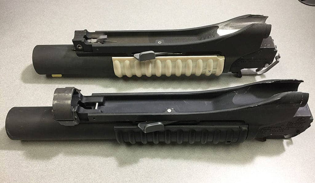 A comparison of a 3D printed grenade launcher and one made with standard manufacturing processes. (Photo: US Army)