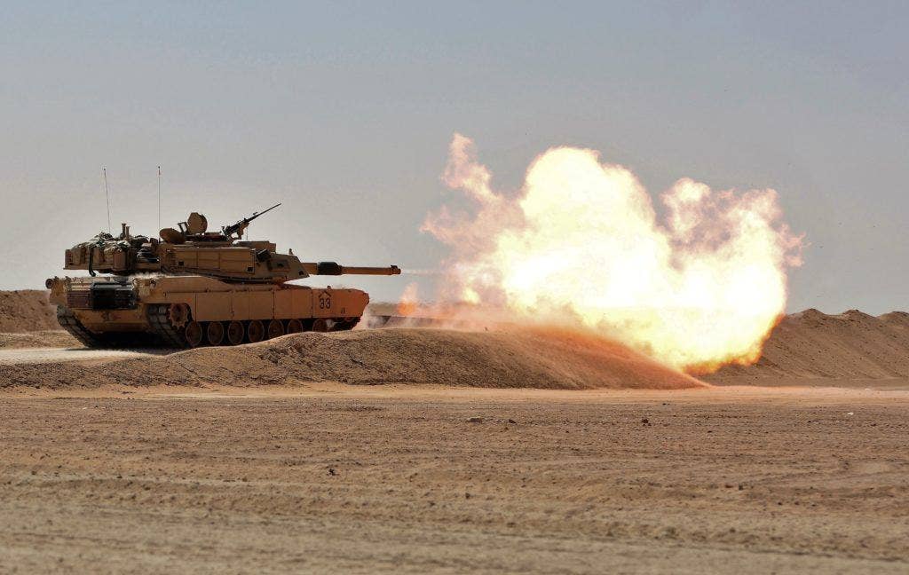 Soldiers from the 3rd Armored Brigade Combat Team, 1st Armored Division, conduct a M1A2 Abrams Main Battle Tank live-fire range at Camp Buehring, Kuwait Oct. 18, 2016. (U.S. Army photo by Sgt. Aaron Ellerman)