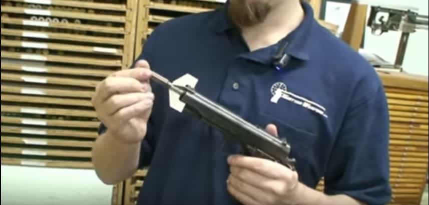 Ian McCollum holds a M1911 with a Bigot system. The dart looks pretty nasty. (YouTube screenshot)