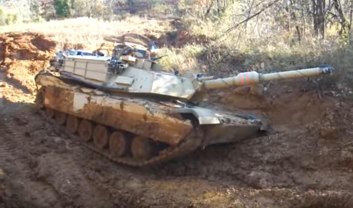 An M1 Abrams stuck in the mud. (YouTube screenshot)