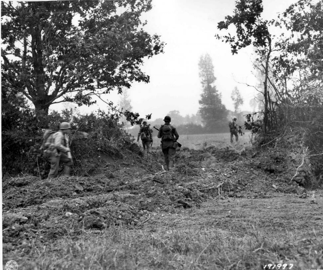 Advancing through an opening in the hedgerows was risky at best. (Photo: U.S. Army)