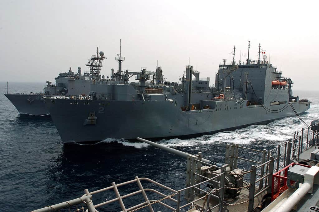USNS Sacagawea (T AKE 2) replenishes two amphibious vessels. (US Navy photo)