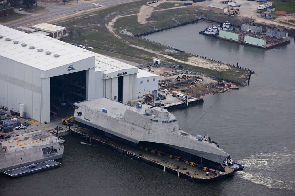 An aerial view of the U.S. Navy littoral combat ship USS Gabrielle Giffords (LCS-10) during its launch sequence at the Austal USA shipyard, Mobile, Alabama (USA). (US Navy photo)