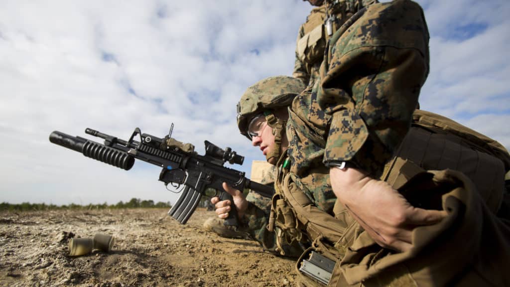 A U.S. Marine assigned to Alpha Company, Infantry Training Battalion, School of Infantry East, loads an M203 Grenade Launcher during a live fire exercise aboard Camp Lejeune, N.C., Jan. 12, 2017. Marines are evaluated in field craft and military occupational specialty tasks under the leadership and supervision of Combat Instructors in order to provide the Marine Corps basically qualified infantry Marines prepared for service in the operating forces. (U.S. Marine Corps photo by Sgt. James R. Skelton)