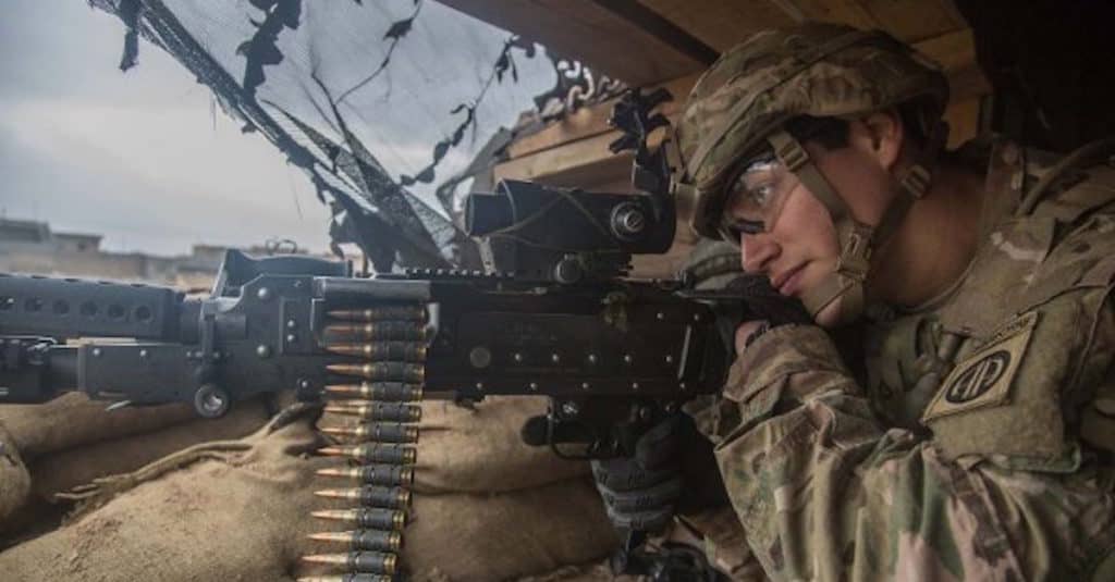 A cavalry scout assigned to the 1st Squadron, 73rd Cavalry Regiment, 2nd Brigade Combat Team, 82nd Airborne Division, scans his sector during his guard shift near Makhmour, Iraq on Jan. 27, 2017. (U.S. Army photo by Spc. Ian Ryan)