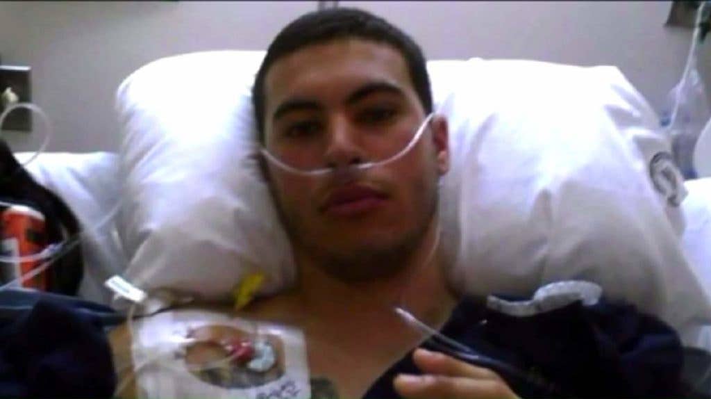 Ferreira recovering after losing both his legs in an IED blast in Afghanistan (Screenshot from PIX11.com video).