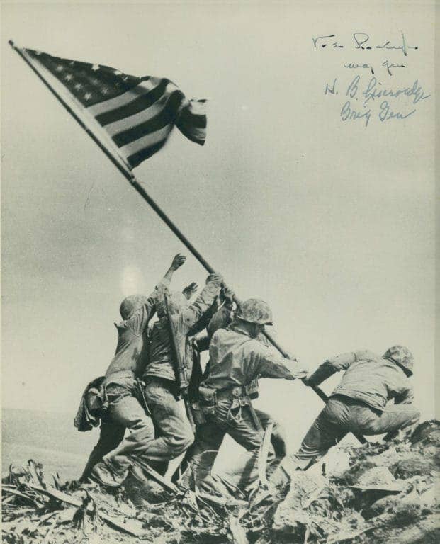 Two flags were raised over Mount Suribachi during the fight to take Iwo Jima. The raising of the second flag became one of the most iconic photos of the war and Marine Corps history. (Photo: U.S. Marine Corps Archives)