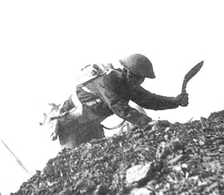 A gurkha moves on an enemy position using his kukri knife in WWII.