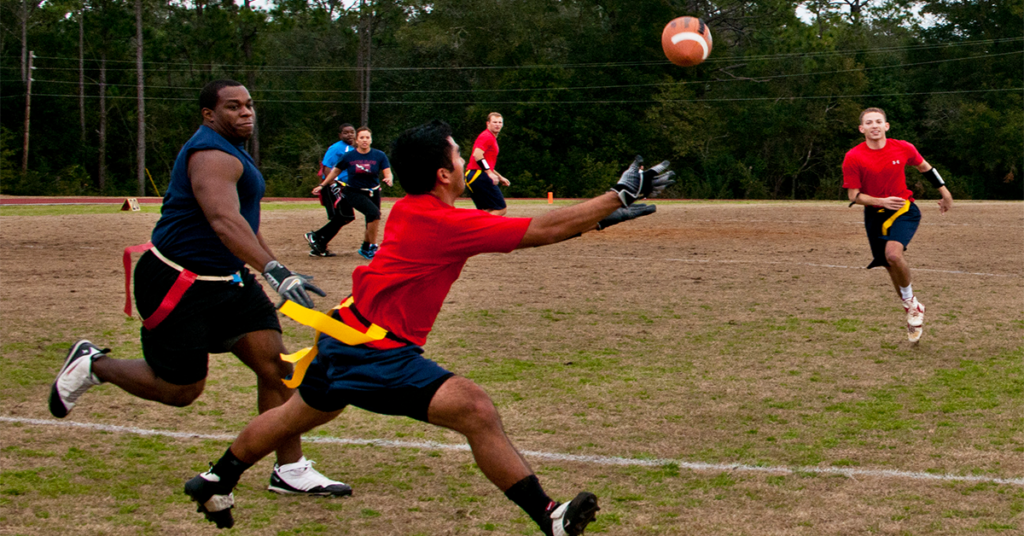 The Company Grade Officers Council goes for another touchdown during their flag football game at Eglin Air Force Base, (U.S. Air Force photo/Samuel King Jr.)