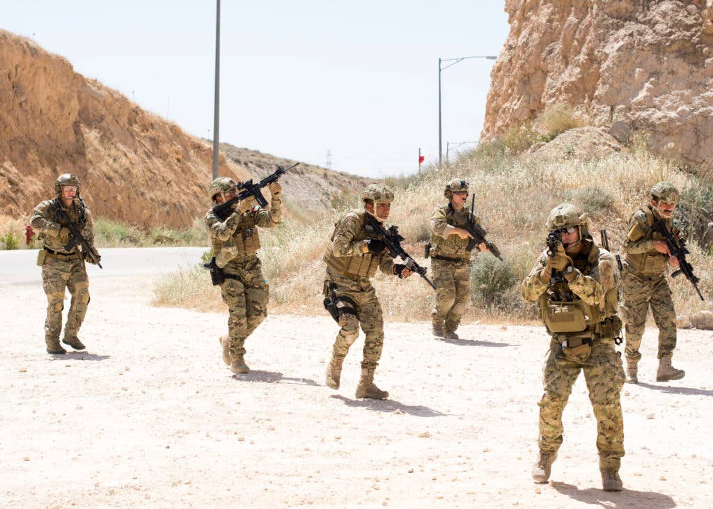 Members of the Air Force Special Operation's 23rd Special Tactics Squad and Jordanian Special Forces participate in small unit tactics at the King Abdullah II Special Operations Training Center in Amman, Jordan during Eager Lion 2017. (U.S. Navy photo by Mass Communication Specialist 2nd Class Christopher Lange/Released)