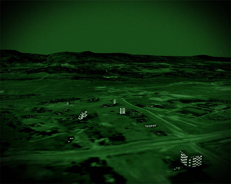 A city in the PARASIM virtual reality environment as viewed through an avatar's night vision. (Photo: PARASIM)