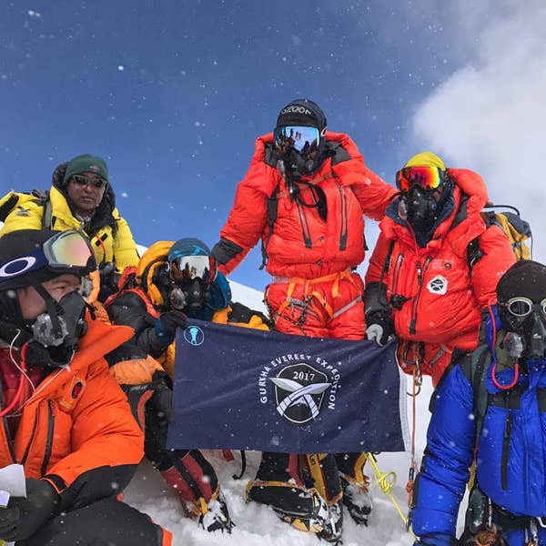 Gurkha soldiers celebrate their successful climb of Mount Everest after they reached the summit on May 15,2017. (Photo: British Ministry of Defence)