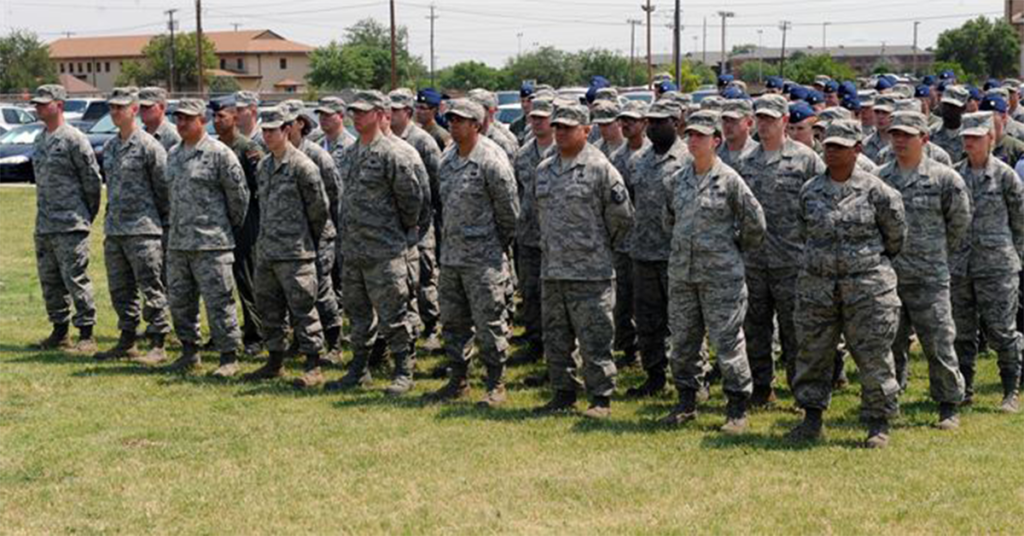 Airmen from the 317th Airlift Group stand at parade rest during a Memorial Day ceremony at Dyess Air Force Base, Texas. (Photo: Airman 1st Class Charles V. Rivezzo/ Released)