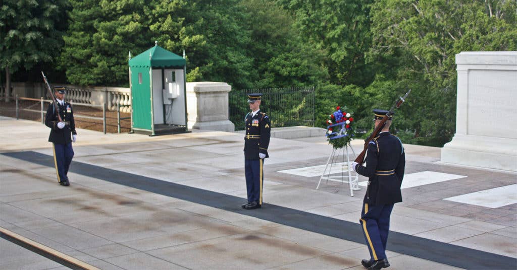 Tomb Sentinels at the Changing of the Guard, Arlington National Cemetery. (Source: Wikipedia Commons)